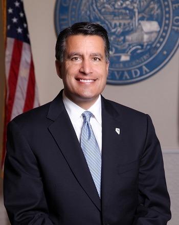 Governor Brian Sandoval praises Russell for his efforts in autism advocacy