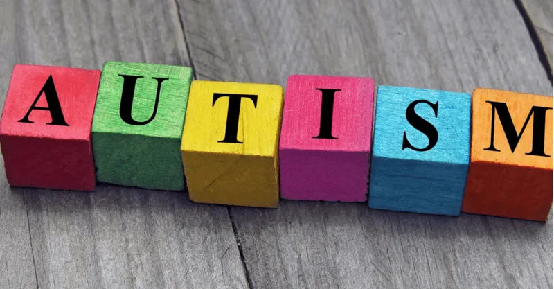 Autism spelled out in colored, wooden blocks